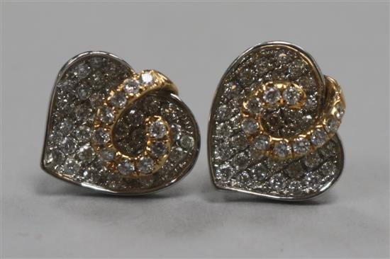 A pair of 18ct white and yellow gold diamond-set heart-shaped earrings (one butterfly missing).